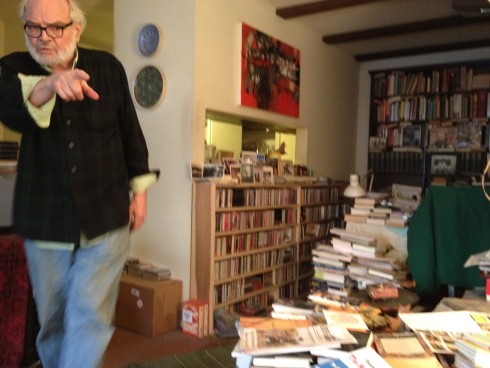 Irby at home in Lawrence, trying to point me toward a CD we wanted to listen to — November 2011.