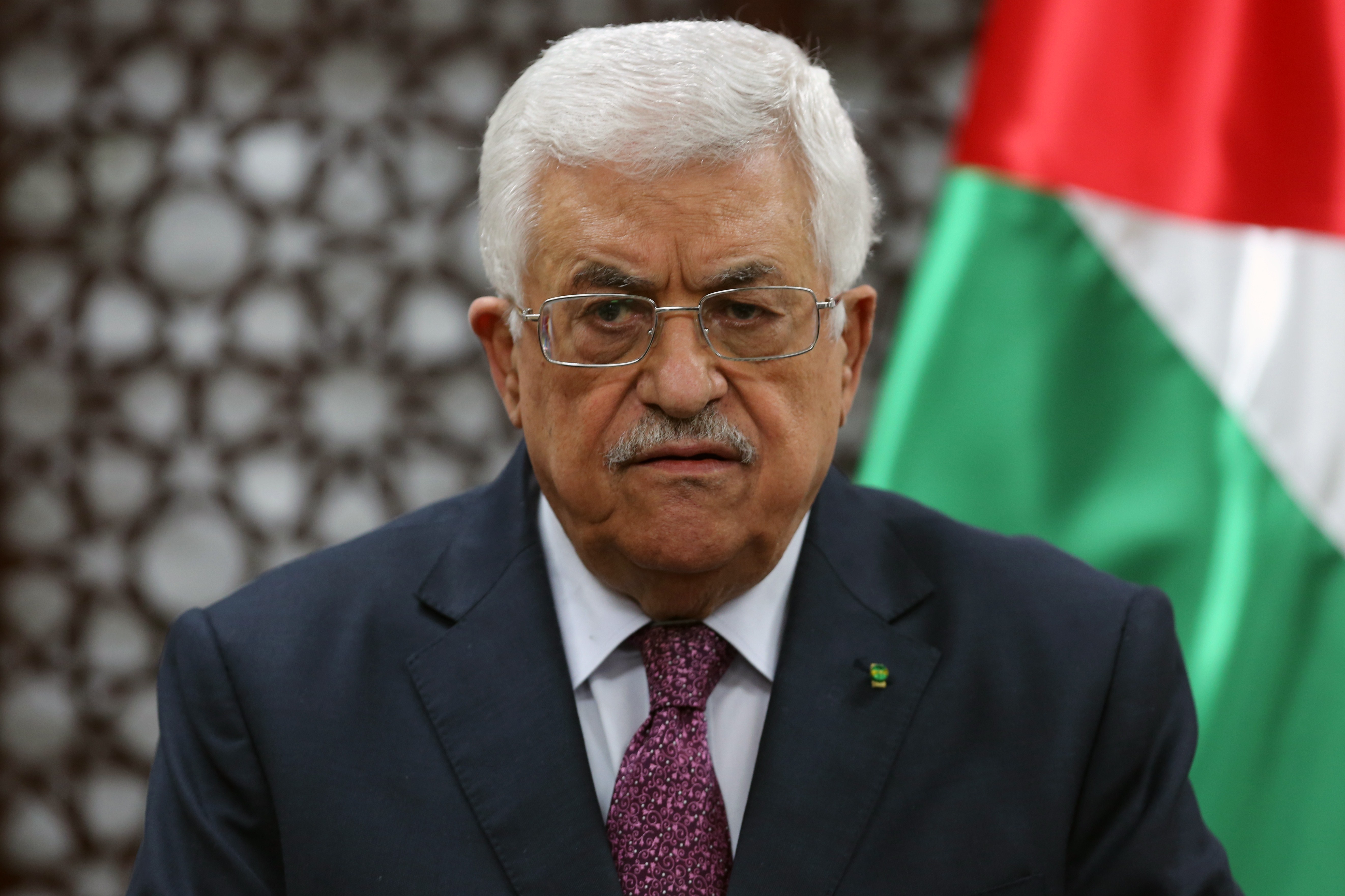 Palestinian president Mahmud Abbas speaks during a press conference on October 8, 2014 in the West Bank City of Ramallah. Clashes broke out as Palestinians protested against Jews visiting the flashpoint holy site on the eve of the week-long holiday for Sukkot, or Feast of Tabernacles, Israeli police said. AFP PHOTO/ABBAS MOMANI (Photo credit should read ABBAS MOMANI/AFP/Getty Images)